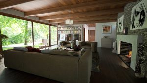 Moderná obývačka s veľkým oknom a krbom